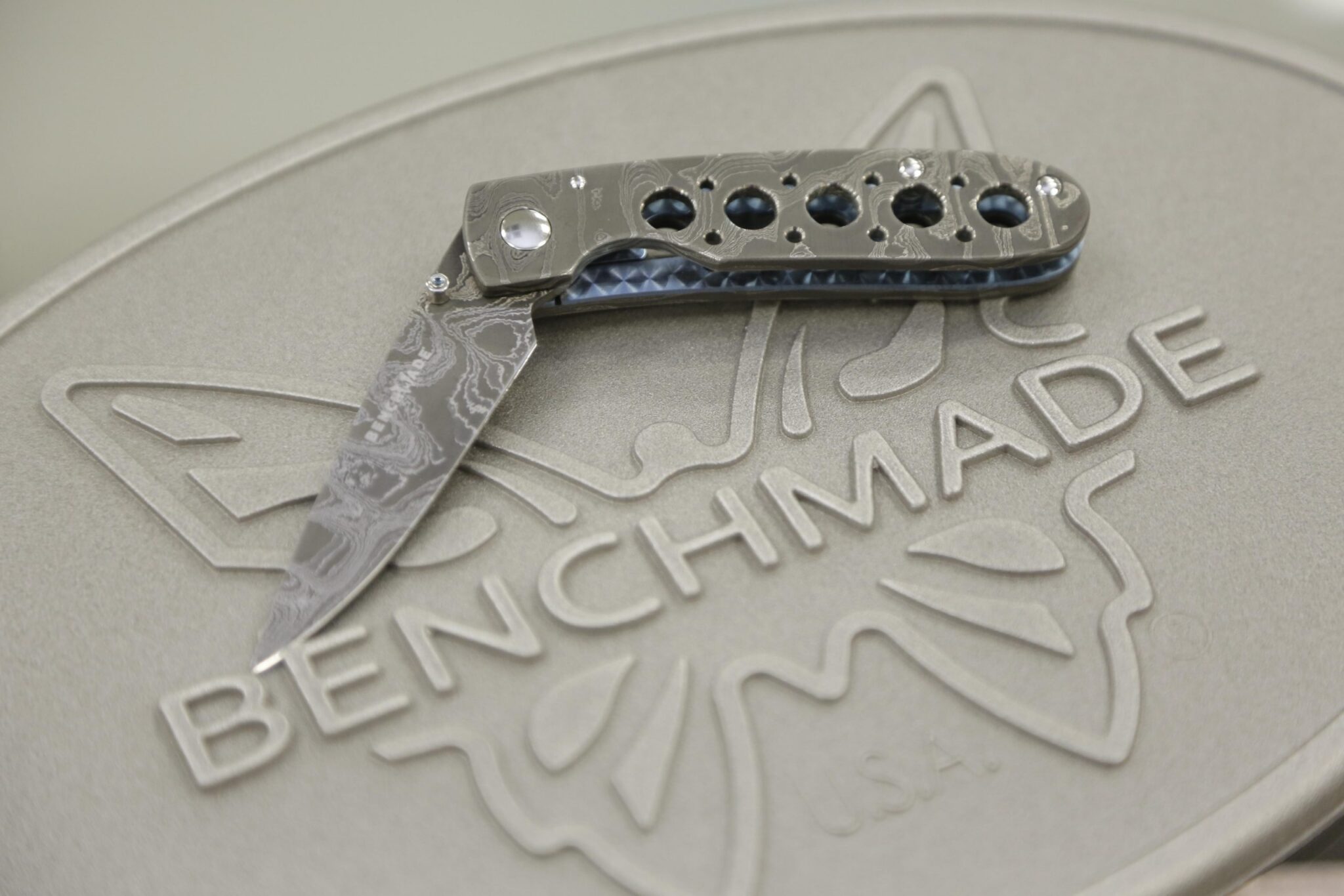 The gray color Benchmade knife