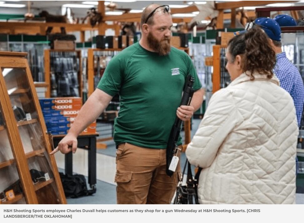 H&H Shooting Sports Firearm Salesman shows customers shotguns for Sale in Oklahoma City